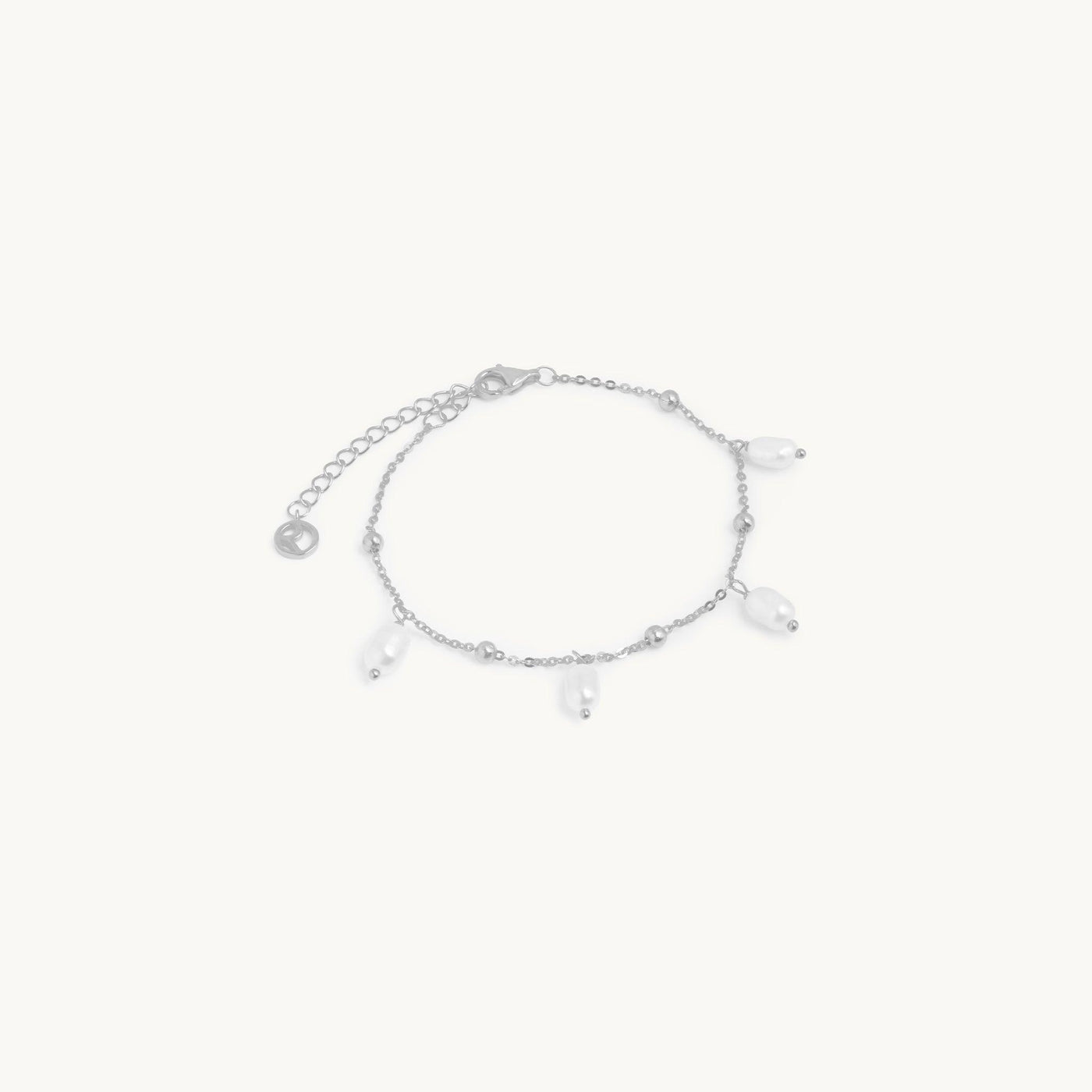 Pulsera de perlas a la deriva