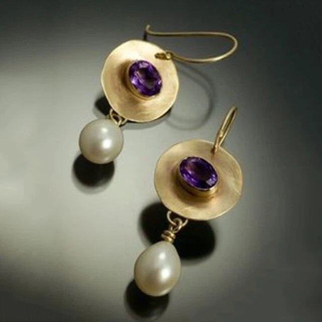 Pendientes vintage de oro con circonita morada y perla